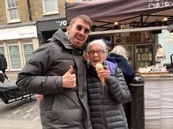 An image showing a man and woman at the Soho Dairy stall eating a Soho Dairy ice cream and giving a thumbs up